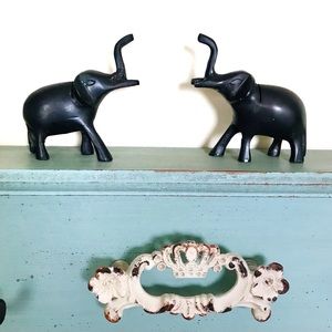 Crafted pair of small iron elephants